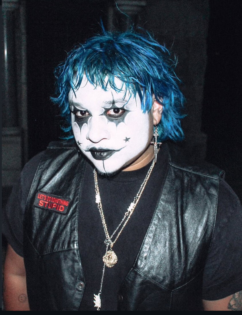 Loveghost portrait in blue hair and clown paint